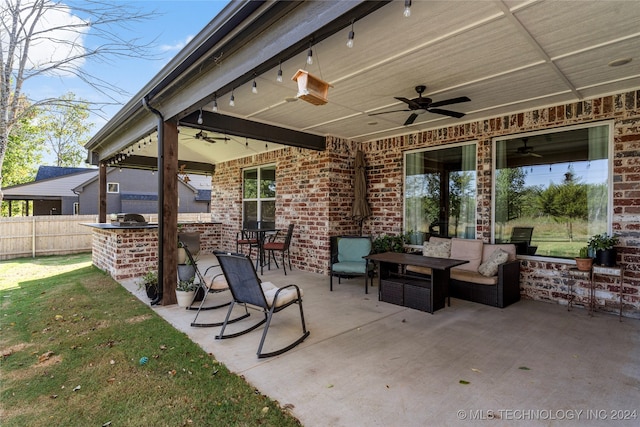 view of patio / terrace featuring ceiling fan and outdoor lounge area