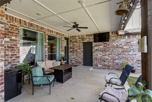 view of patio / terrace featuring an outdoor living space and ceiling fan