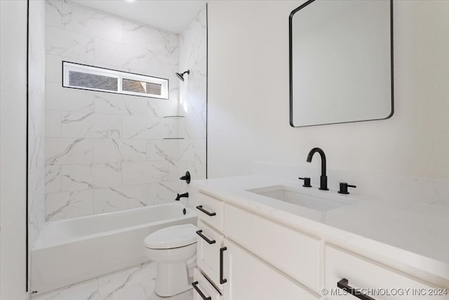 full bathroom featuring vanity, tiled shower / bath combo, and toilet