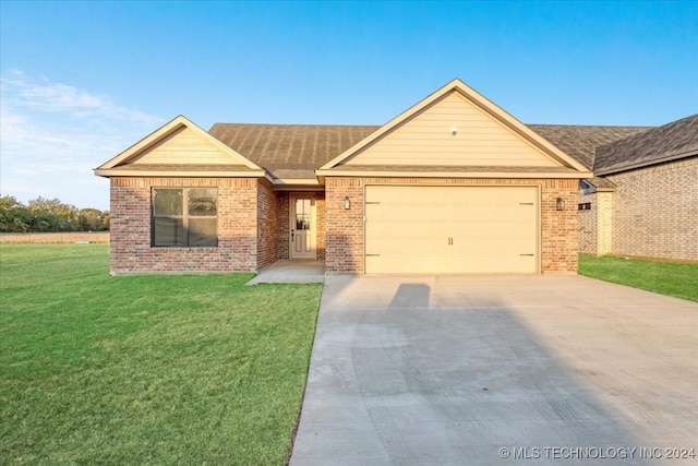 ranch-style home with a front yard and a garage