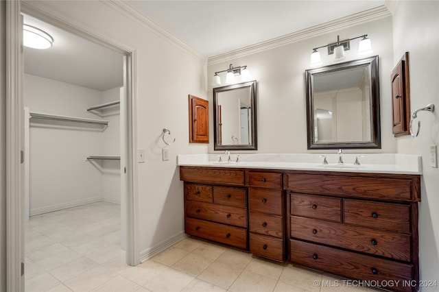 bathroom featuring vanity and crown molding