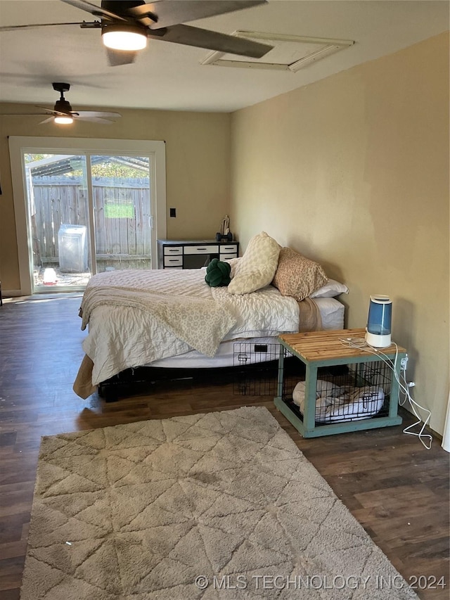 bedroom with access to exterior, a ceiling fan, and wood finished floors