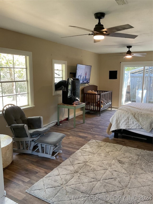 bedroom with wood finished floors