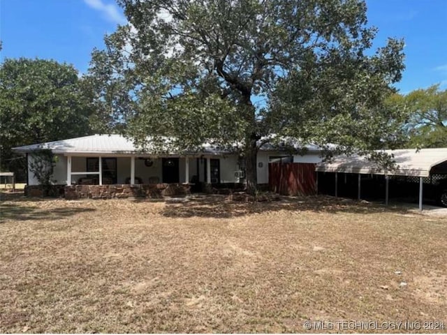 view of front of home with a carport