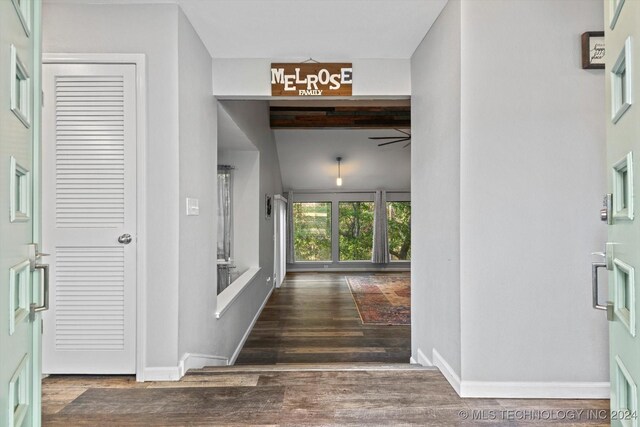 corridor featuring dark hardwood / wood-style floors