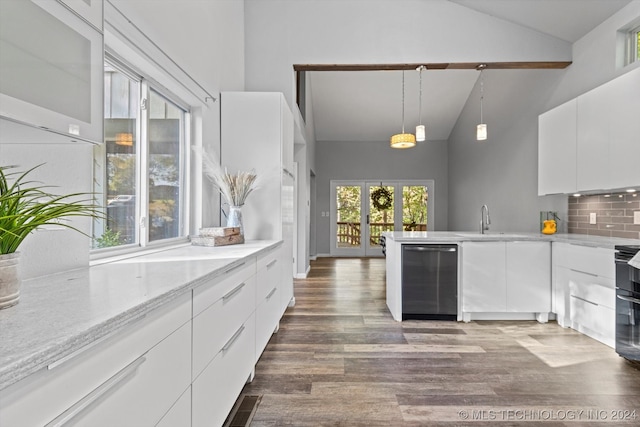 kitchen featuring dishwasher, backsplash, white cabinets, dark hardwood / wood-style floors, and decorative light fixtures