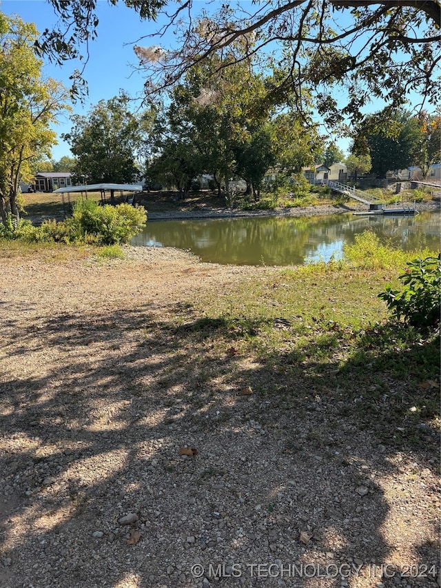 view of yard with a water view