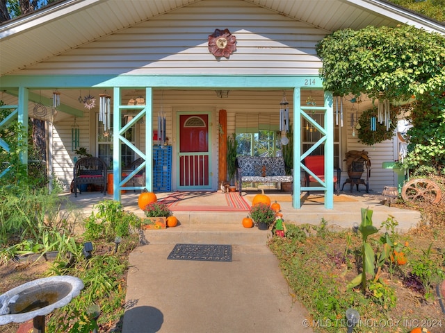 entrance to property with a porch