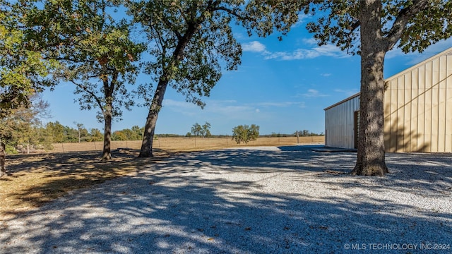 view of street featuring a rural view