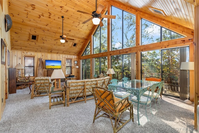 interior space featuring ceiling fan, wooden ceiling, and vaulted ceiling