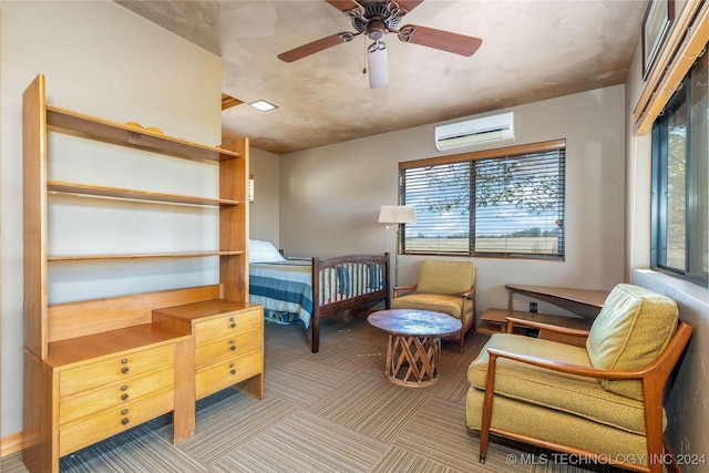 living area featuring ceiling fan, carpet floors, and a wall mounted air conditioner