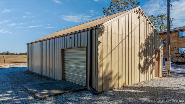 view of outdoor structure with a garage