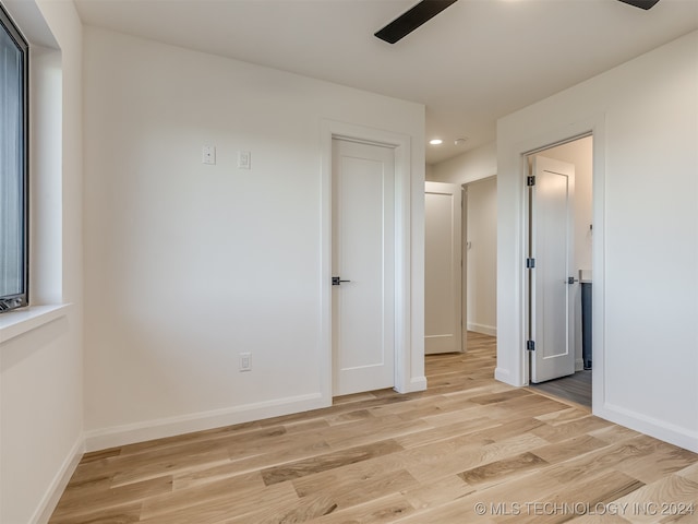 spare room featuring light hardwood / wood-style flooring