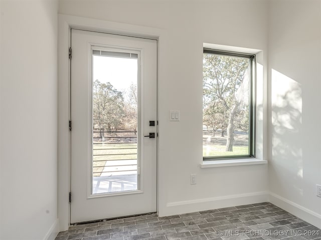 doorway to outside with plenty of natural light