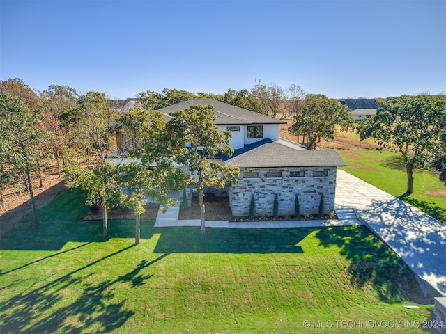 exterior space with a front lawn