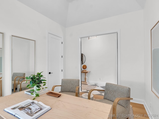 dining area with hardwood / wood-style flooring