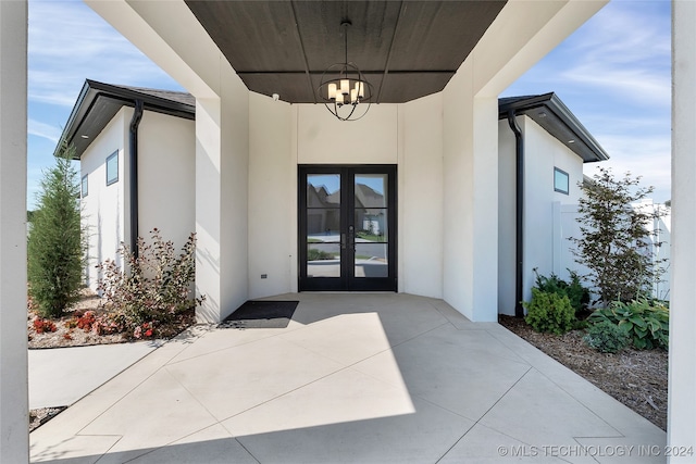 doorway to property featuring french doors