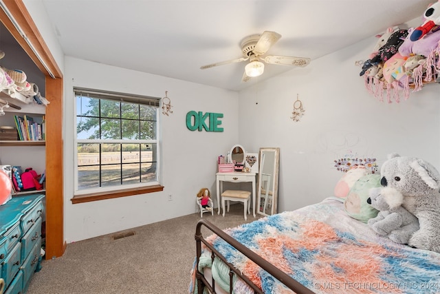 bedroom featuring ceiling fan and carpet floors