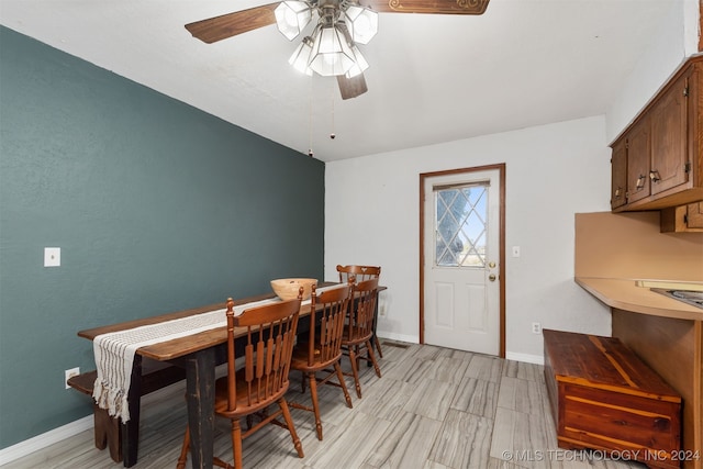 dining room with ceiling fan