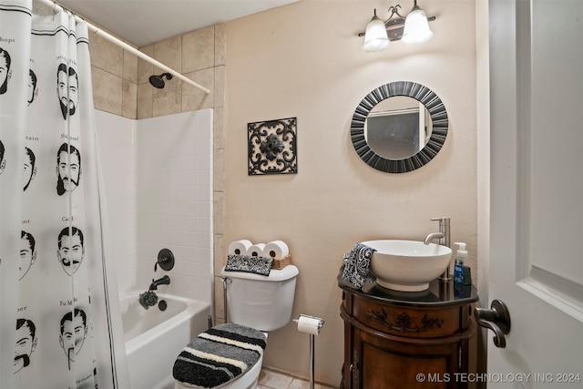 full bathroom featuring toilet, shower / bath combo, vanity, and tile patterned flooring