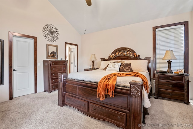 carpeted bedroom featuring high vaulted ceiling and ceiling fan