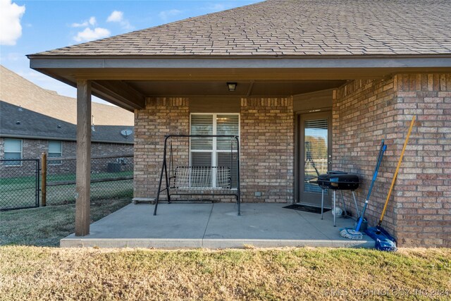 view of patio with a grill