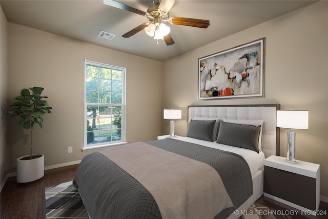 bedroom featuring dark wood-type flooring and ceiling fan