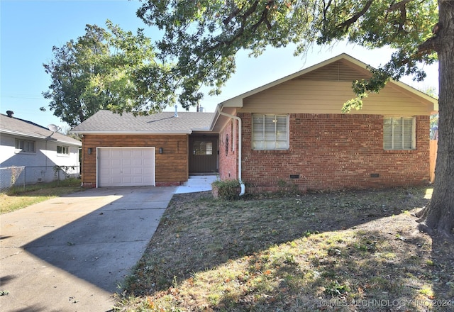 view of front of home with a garage