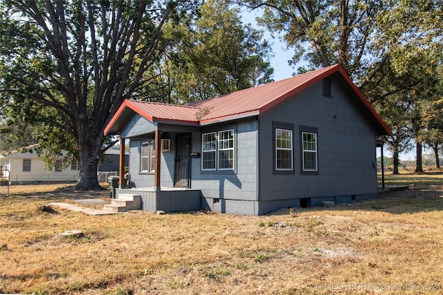 view of front of house with a front yard