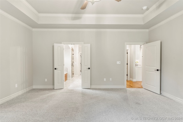 unfurnished bedroom with ceiling fan, light carpet, and ornamental molding