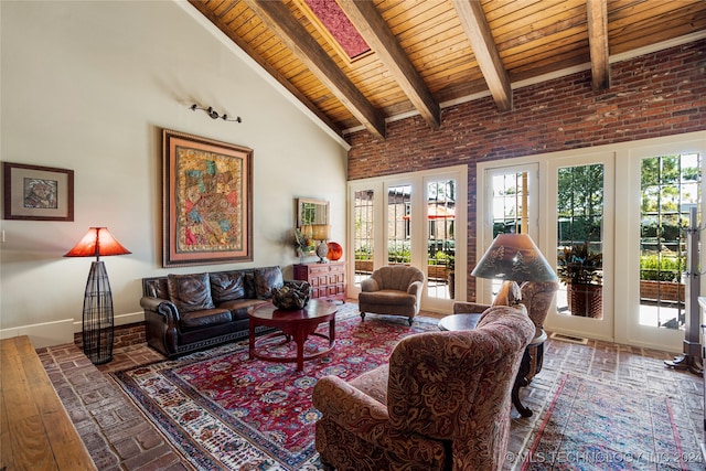 living room featuring hardwood / wood-style floors, beam ceiling, high vaulted ceiling, and wooden ceiling