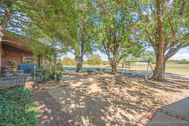 view of yard featuring a playground