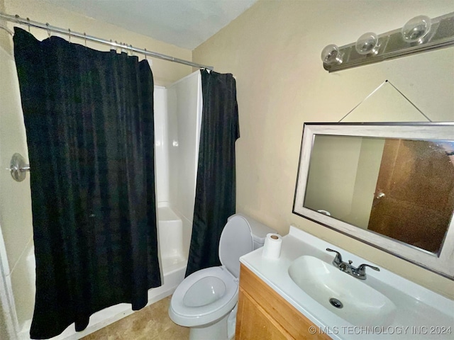 full bathroom featuring vanity, shower / tub combo with curtain, and toilet