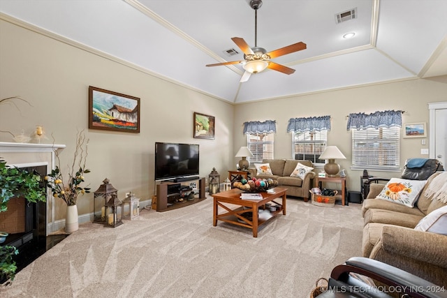 carpeted living room featuring lofted ceiling, crown molding, and ceiling fan