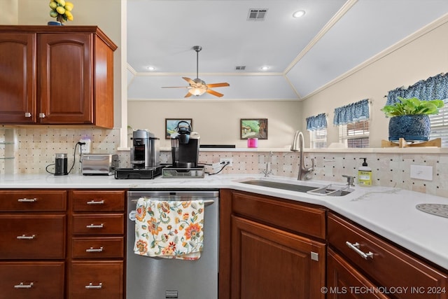 kitchen featuring sink, dishwasher, ceiling fan, crown molding, and decorative backsplash