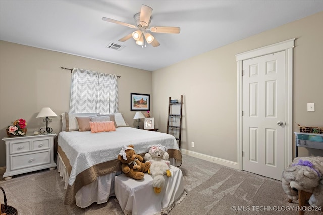 carpeted bedroom featuring ceiling fan