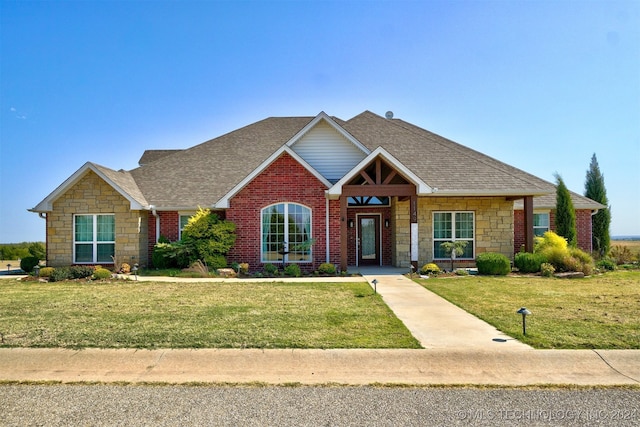 view of front of home with a front yard