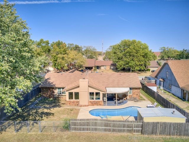 view of pool featuring a patio area