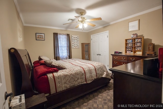 bedroom with a closet, ceiling fan, and crown molding