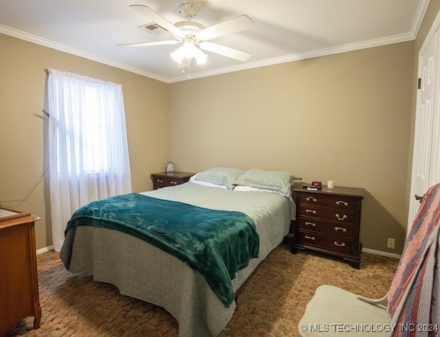 carpeted bedroom featuring ceiling fan and ornamental molding