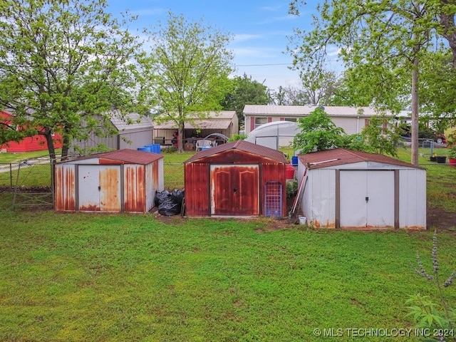 view of outdoor structure featuring a yard