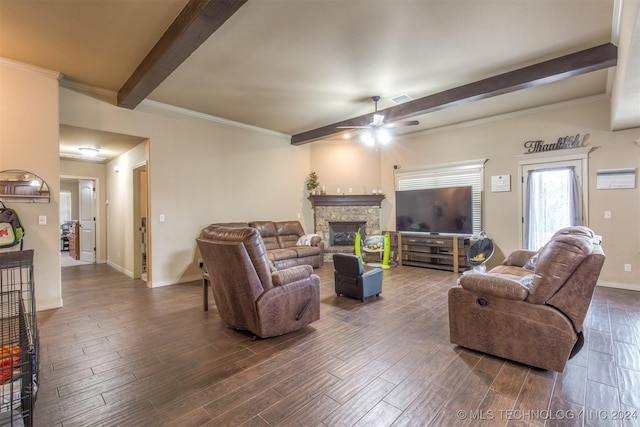 living room featuring ceiling fan, dark wood-style flooring, a fireplace, beam ceiling, and baseboards