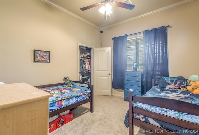 bedroom with baseboards, ornamental molding, carpet flooring, and ceiling fan