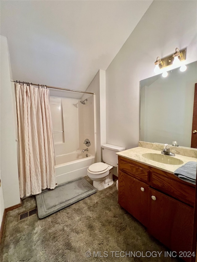 full bathroom featuring toilet, lofted ceiling, vanity, and shower / tub combo