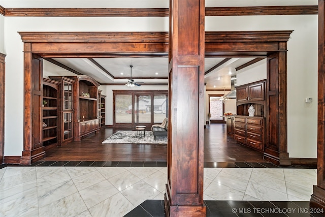 entryway with crown molding, ornate columns, light hardwood / wood-style floors, and ceiling fan