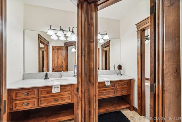 bathroom with vanity and tile patterned floors