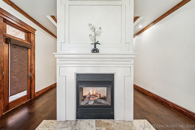 room details featuring hardwood / wood-style floors and crown molding