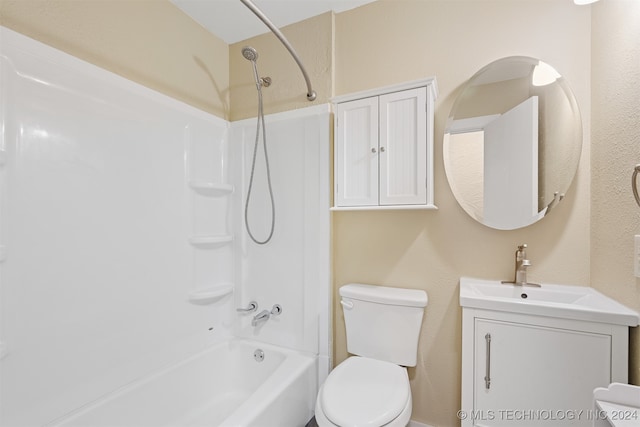 full bathroom with toilet, vanity, and bathing tub / shower combination