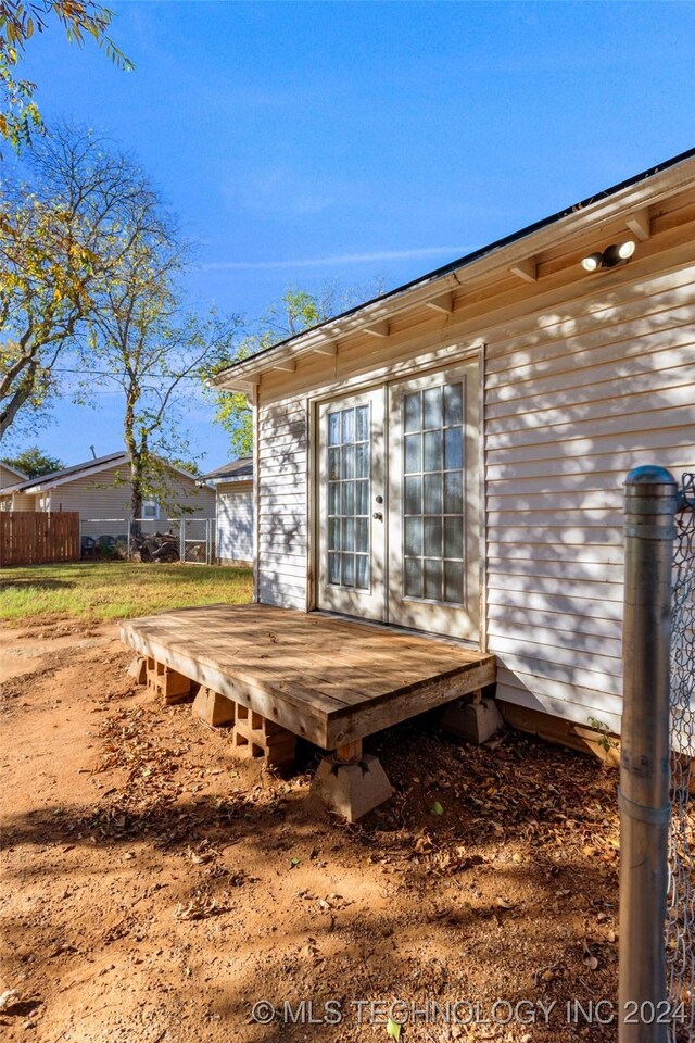 921 D NW, Ardmore, OK 73401 - wooden deck featuring french doors