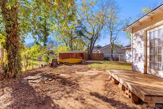 view of yard with a deck